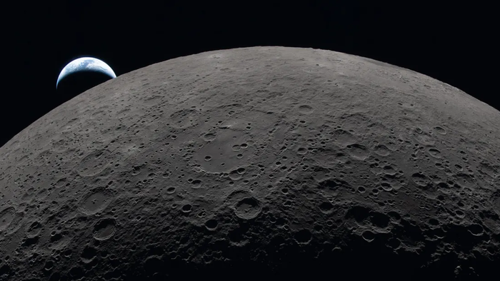 Astronautas da missão Artemis II observando a Lua da espaçonave Integrity durante um eclipse solar.